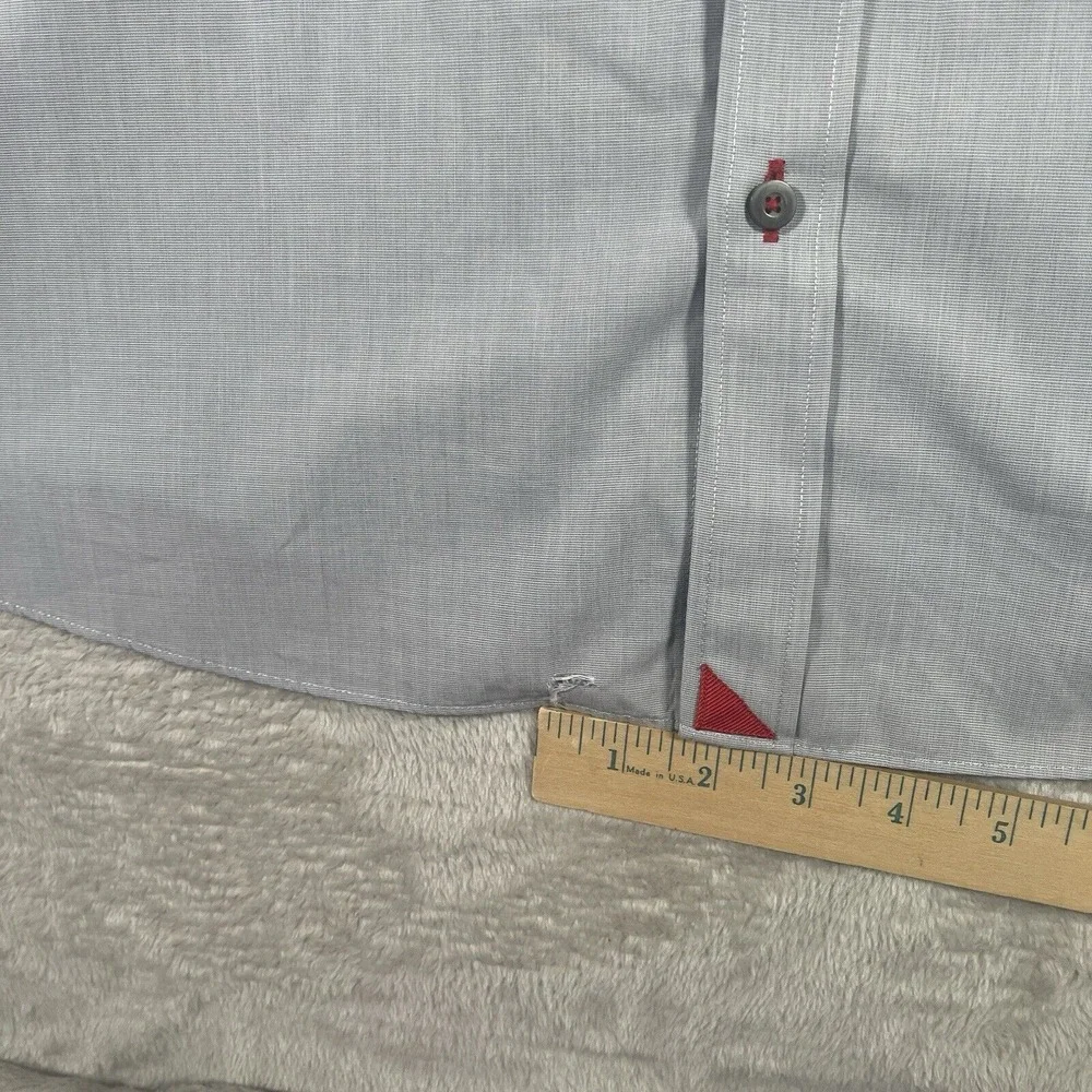 UNTUCKit small tear